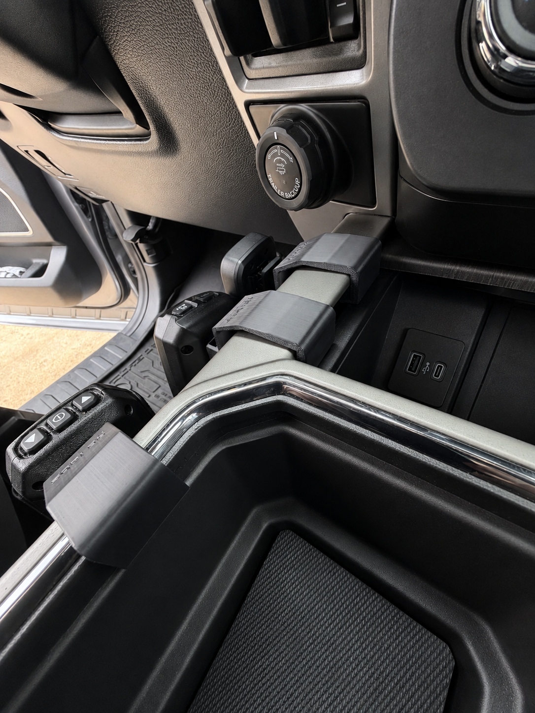 Clips into existing slots in center console